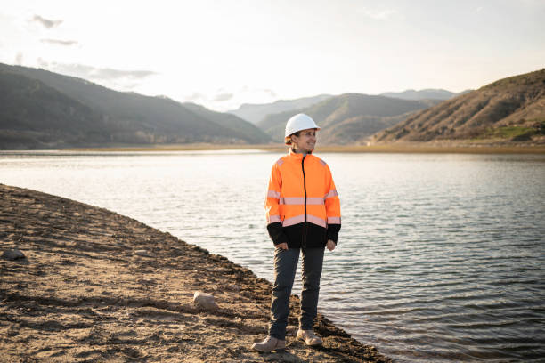 istock Female Hydroelectric Engineer Work Day. Renewable Energy Systems. 2083463990