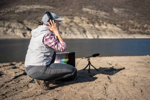 field biologist uses ai in bioacoustics monitoring. soundscape ecology. - soundscape ストックフォトと画像