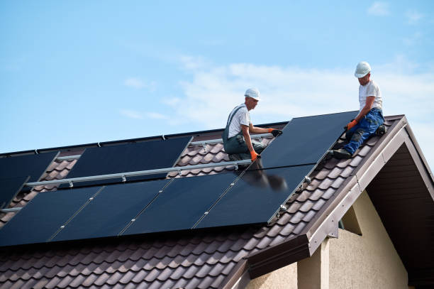istock Workers building solar panel system on roof of house. Men installing photovoltaic solar module 2083478196