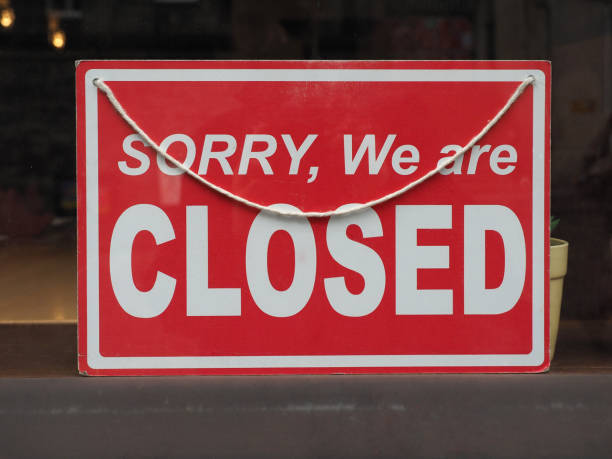 istock sorry closed sign in shop window 2083487074