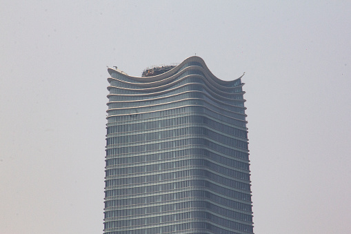 Shanghai, China - april 16/2017 - one of unique tower in center of Shanghai, White Magnolia Plaza