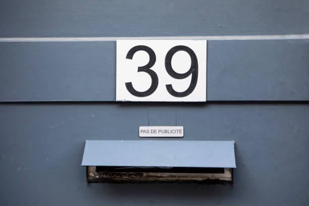 istock Number 39 and letterbox on a grey door 2083490731