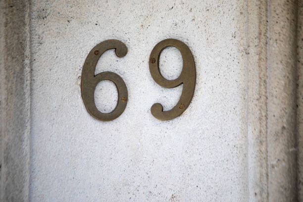 istock Number 69 on the outside of a building 2083494064