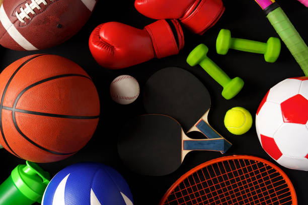 istock Various sports equipment on black background studio shot 2083515120