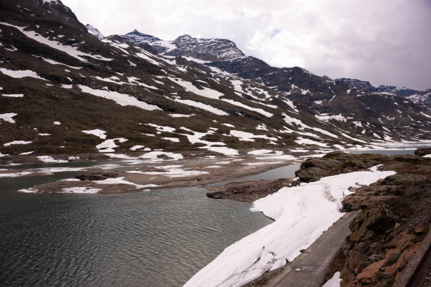 istock Mountain lake with ice in Switzerland in spring 2083557216