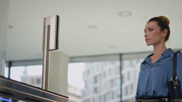 istock Employee opening office entrance using face id turnstile in building close up. 2083562709