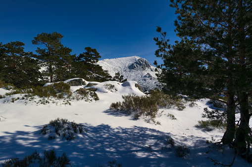 winter mountain landscape in the sierra de guadarrama mountains near madrid, spain