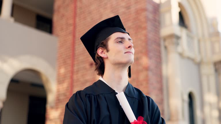 Happy man, student and thinking in graduation, scholarship or career ambition at campus. Male person or graduate smile with diploma, certificate or degree for dream, goals or academic milestone