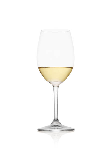 istock Half full wine glass with white wine isolated on white background 2083574102