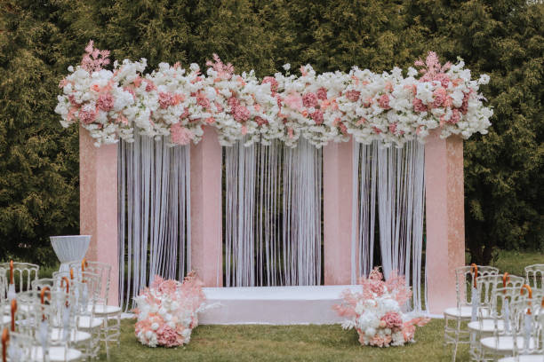 istock Ceremony, Arch, Wedding Arch, Wedding, Wedding Moment, Decorations, Decor, Wedding Decorations, Flowers, Chairs, Outdoor Ceremony, Flower Bouquets. 2083575211