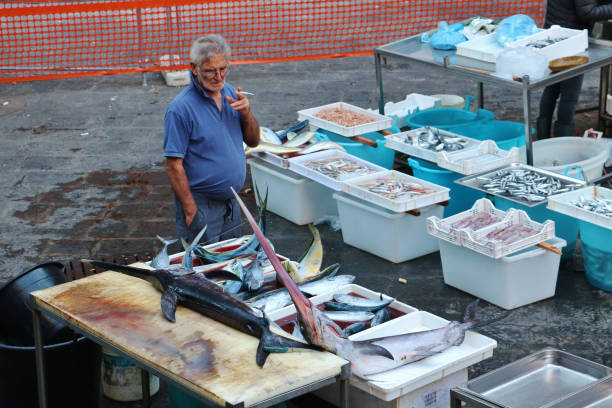 Catania, Italy - October 5th 2022: Fresh seafood selling in Catania Fish Market