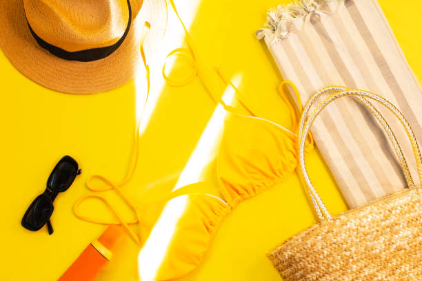 istock Fashionable beach accessories on an orange background 2083587897