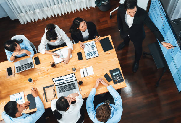 istock Multi ethnic diversity business people and modern business project. Habiliment 2083588435