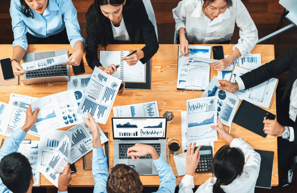 istock Panorama top view diverse analyst team analyzing financial data. Habiliment 2083618738