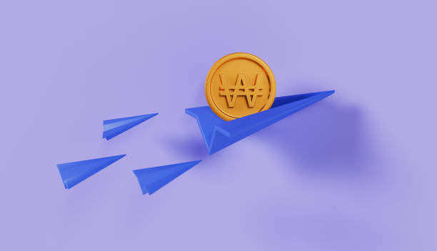 istock Paper Plan Flying with Won Coin on Pastel Color Background 2083623516