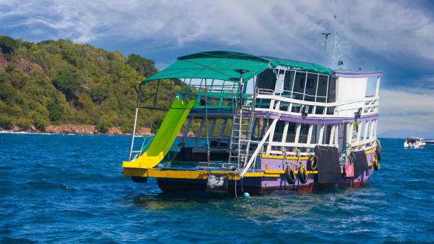 Empty tourist double decker boat at sea, Thailand