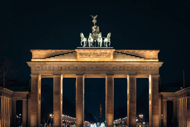 The Brandenburg Gate in the evening, Berlin, Germany. Stars with the gate