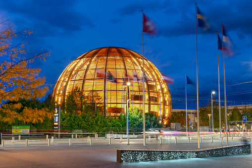 Geneva, Switzerland - October 3, 2023: Cern Visitor Center at blue hour. The research center operates the largest particle physics laboratory in the world.