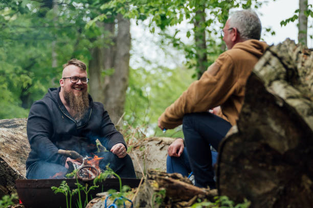 istock Laughing around the Fire with Friends 2083696865