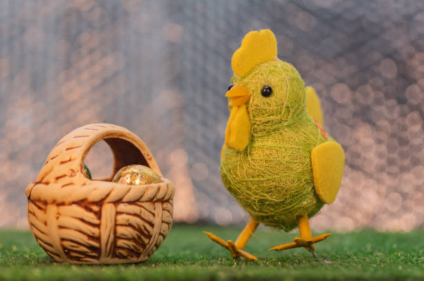 Easter composition with little yellow chick, eggs