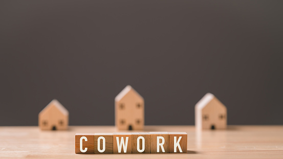 concept co-working, A wooden block with the word cowork written