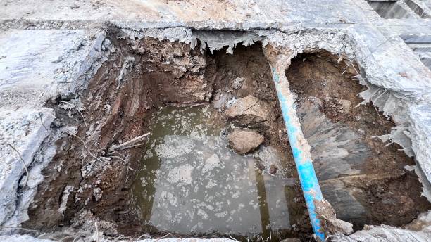 istock Hole in a street for repair of construction work 2083794524