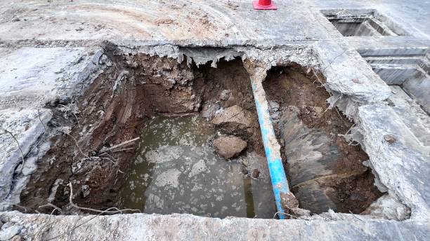 istock Hole in a street for repair of construction work 2083797750