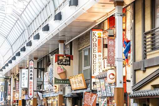 Japan - October 13, 2023 : The indoor shopping arcade street and stores located along Asakusa Shin-Nakamise Dori Street near Sensoji with crowds of people shopping