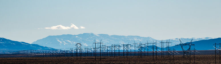 Many power lines and mountains.