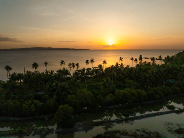 Tropical Island and sea with sunset background. Santa Fe, Tablas, Romblon. Philippines.
