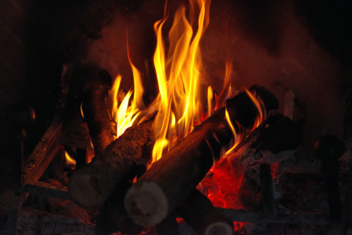 closeup of wood burning in a fireplace
