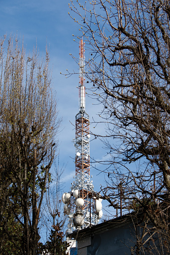 Antenna on a hill above the city