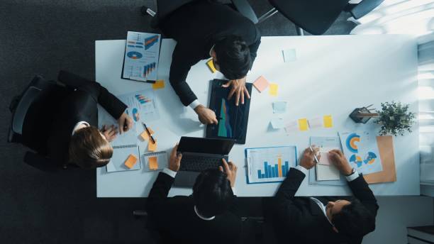istock Top view of smart manager standing and present marketing plan. Directorate. 2083856312