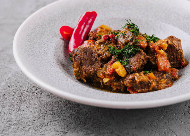 istock beef goulash with red pepper close up 2083863715