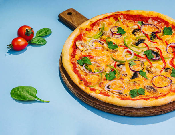 istock vegetarian pizzas with cheese top view 2083864363