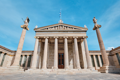 Athens, Greece - March 03, 2024: Architectural details of Academy of Athens, on the columns are goddess Athena and Apollo