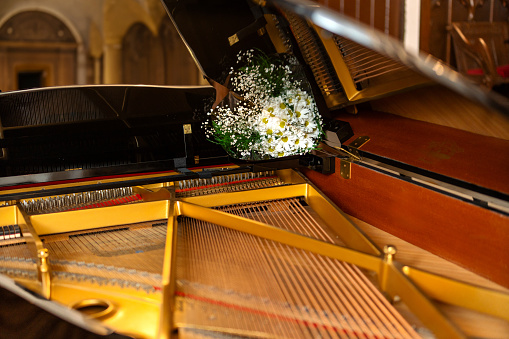 Classic grand piano inside a church