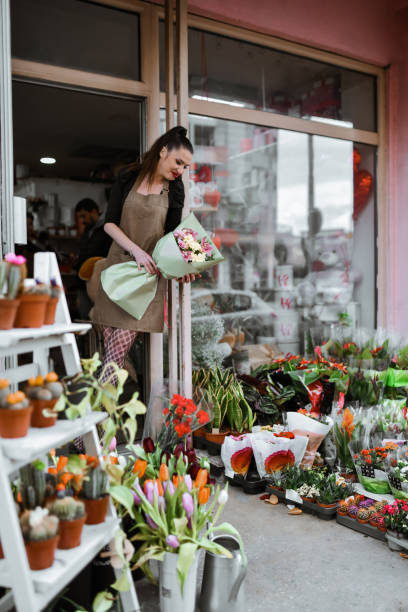 istock Day Dreaming Time For Cute Female Florist Among Her Flowers 2083887708