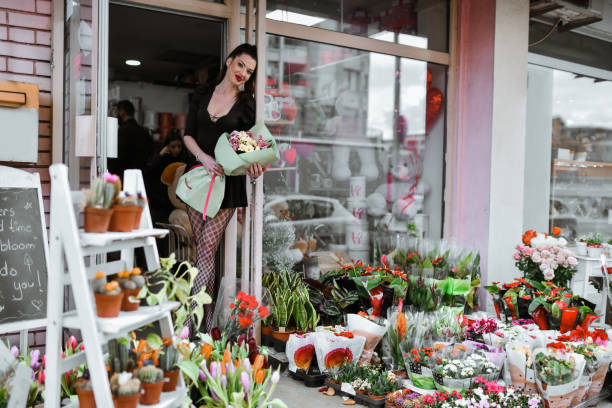 istock Beautiful Female Getting A Bouquet Gift From Flower Store 2083896652