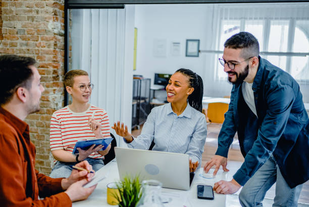 istock Multicultural businesspeople working in an office 2083899967