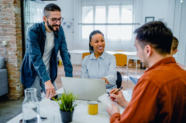istock Young multi-ethnic businesspeople working together 2083922885