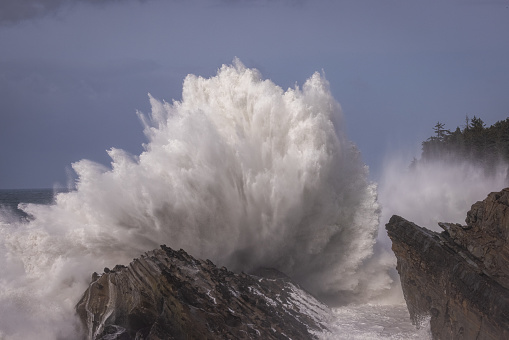 Giant waves crashing against the rocks in Shore Acres, Oregon creating a spectacular landscape specially during the winter months when the storms move in.