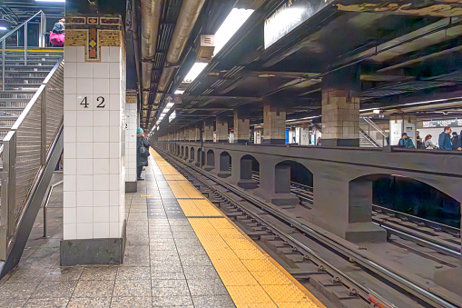 Manhattan, New York, USA - March 2024. Empty subway platform in a station at Bowling Green, New York City, USA.