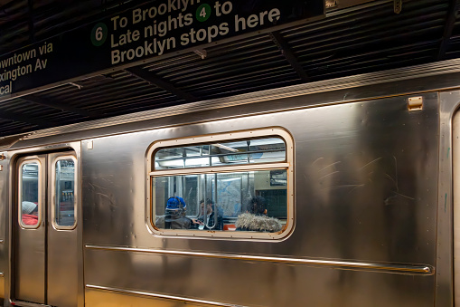 Manhattan, New York, USA - March 2024. Subway car in a station at Bowling Green, New York City, USA.