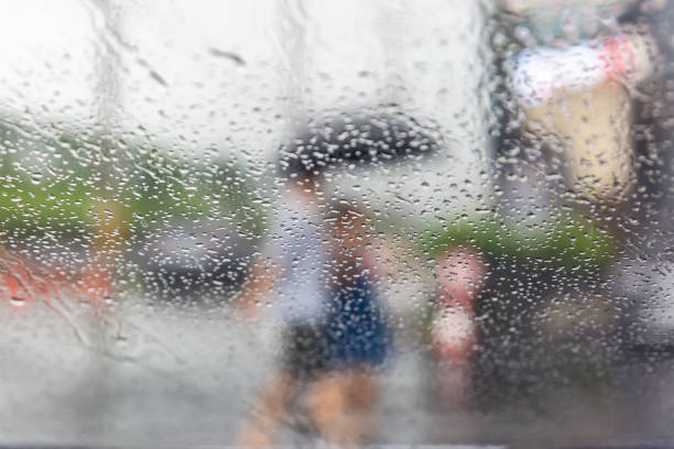 istock a rainy day scene reflected in a glass window 2083972729
