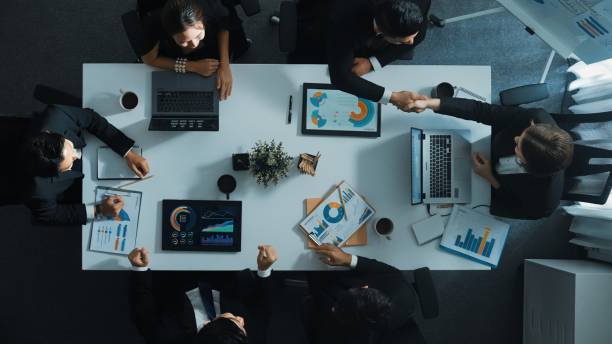 istock Top view of manager present growth graph while team shaking hand. Directorate. 2083986280