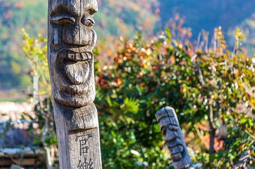 First Nations Totem Poles during a fall season at Stanley Park in Vancouver, British Columbia, Canada.