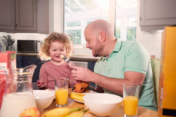 istock Dad and Daughter Healthy Eating 2084006070