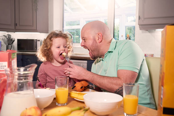 istock Dad and Daughter Healthy Eating 2084008282