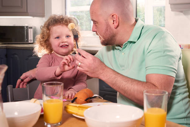 istock Dad and Daughter Healthy Eating 2084009844
